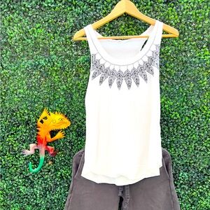 Versatility alert! This tank top is your summer style BFF.